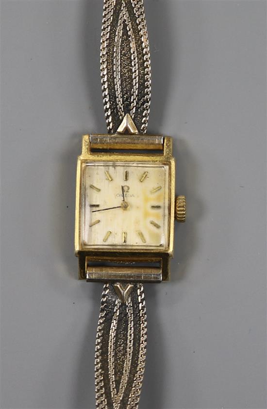 A ladys gold plated Omega manual wind wrist watch.